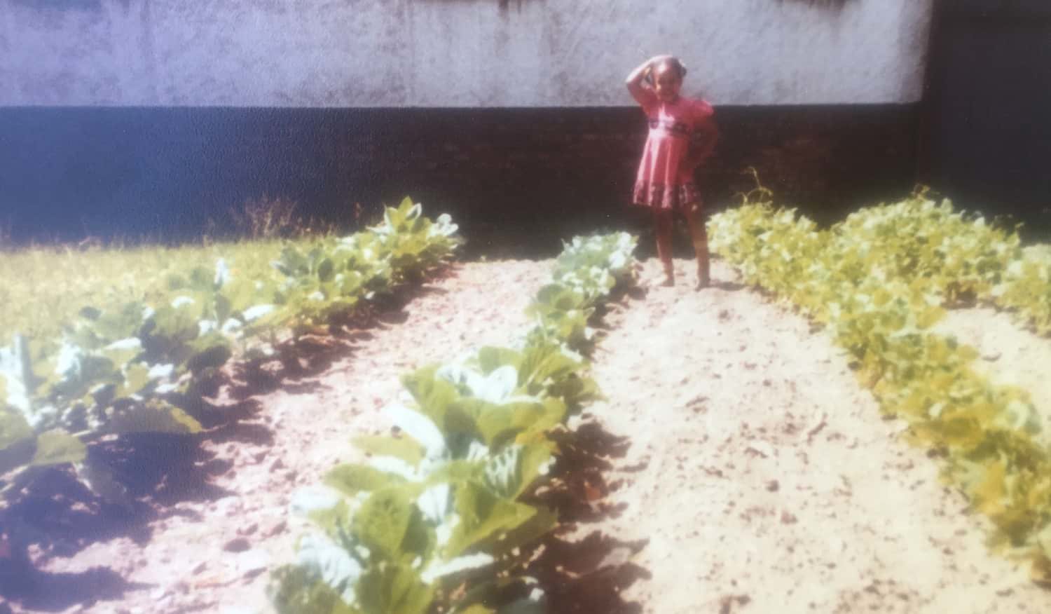 Aja Yasir in her parent's garden in Chicago as a child.