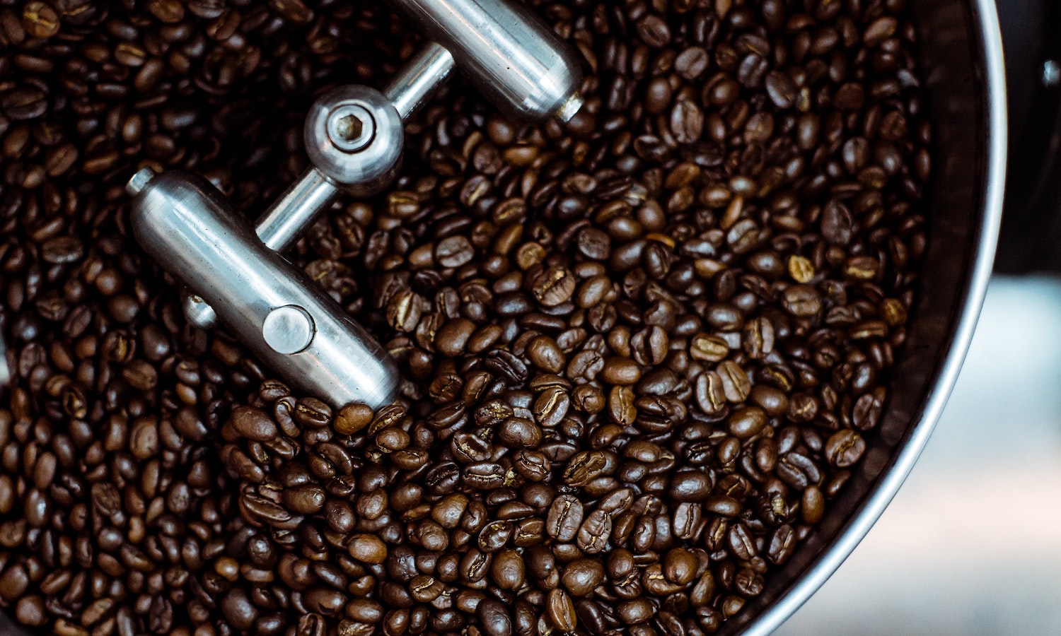 How Sustainable Is Your Coffee - coffee in a grinder