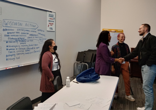 Solana Patterson-Ramos connects with local Wisconsin food entrepreneur during FEED Summit.