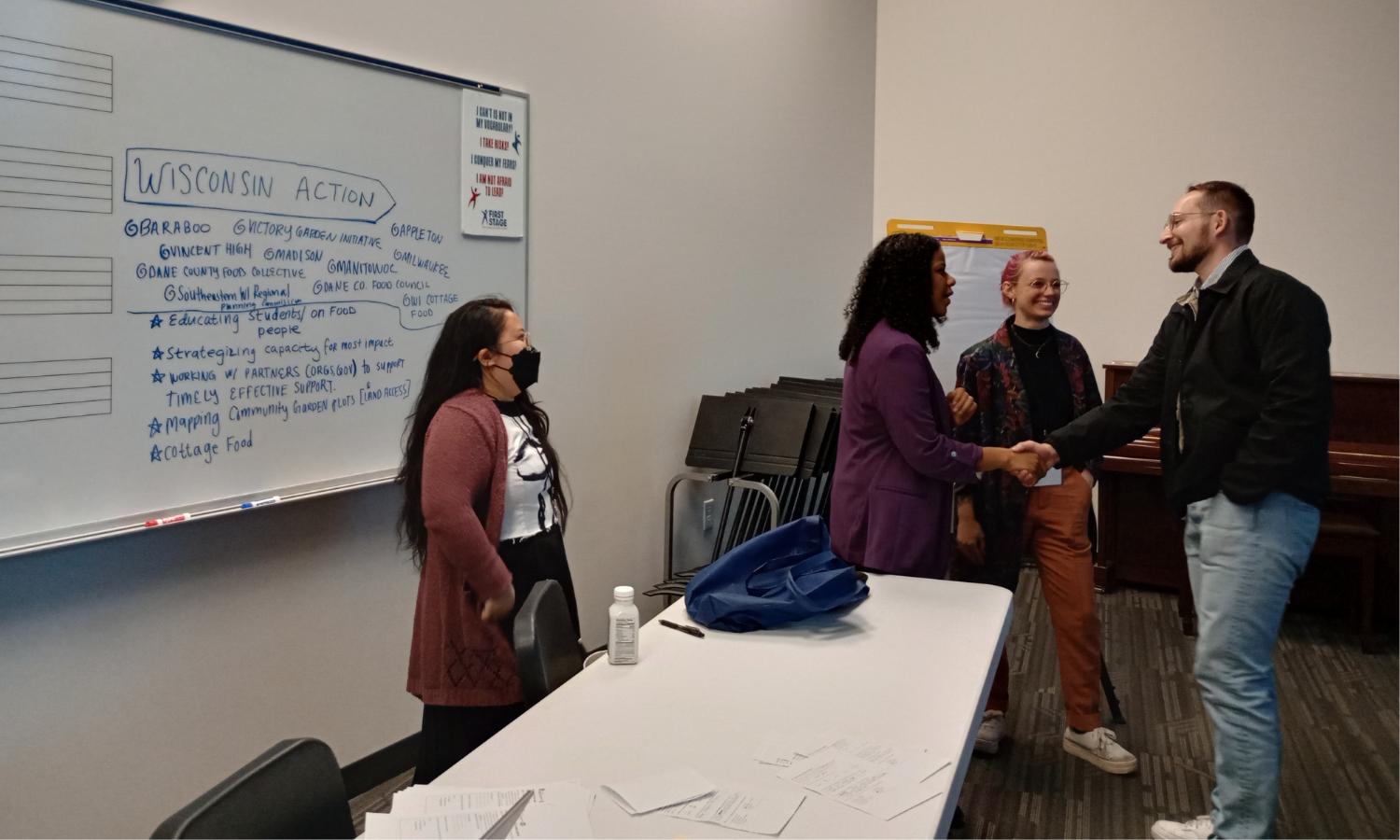 Solana Patterson-Ramos connects with local Wisconsin food entrepreneur during FEED Summit.